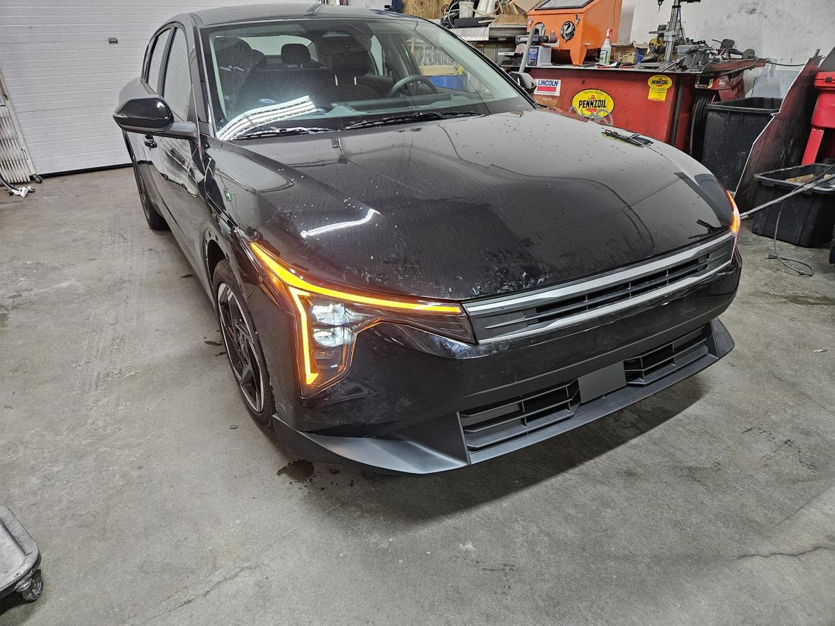 The same sedan repaired