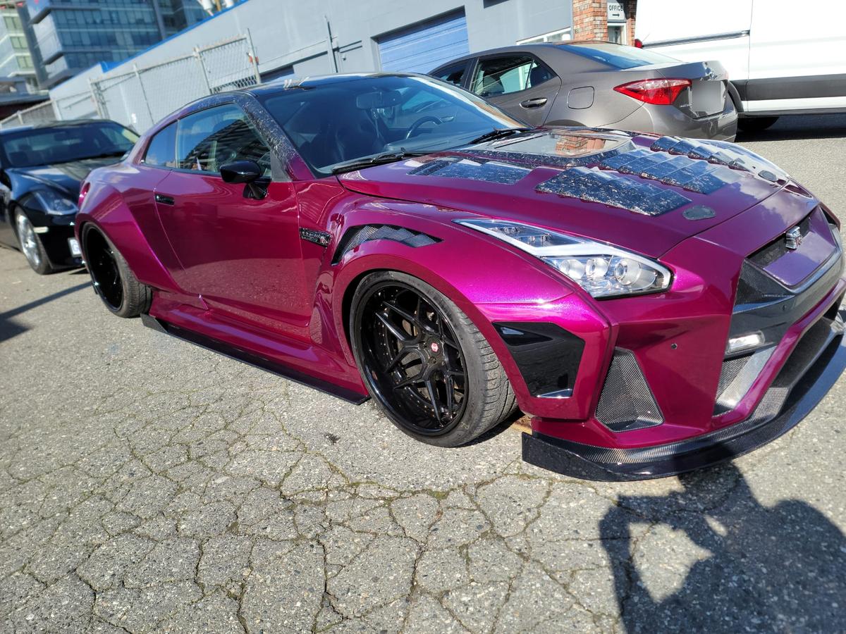 Sports car finished in custom purple